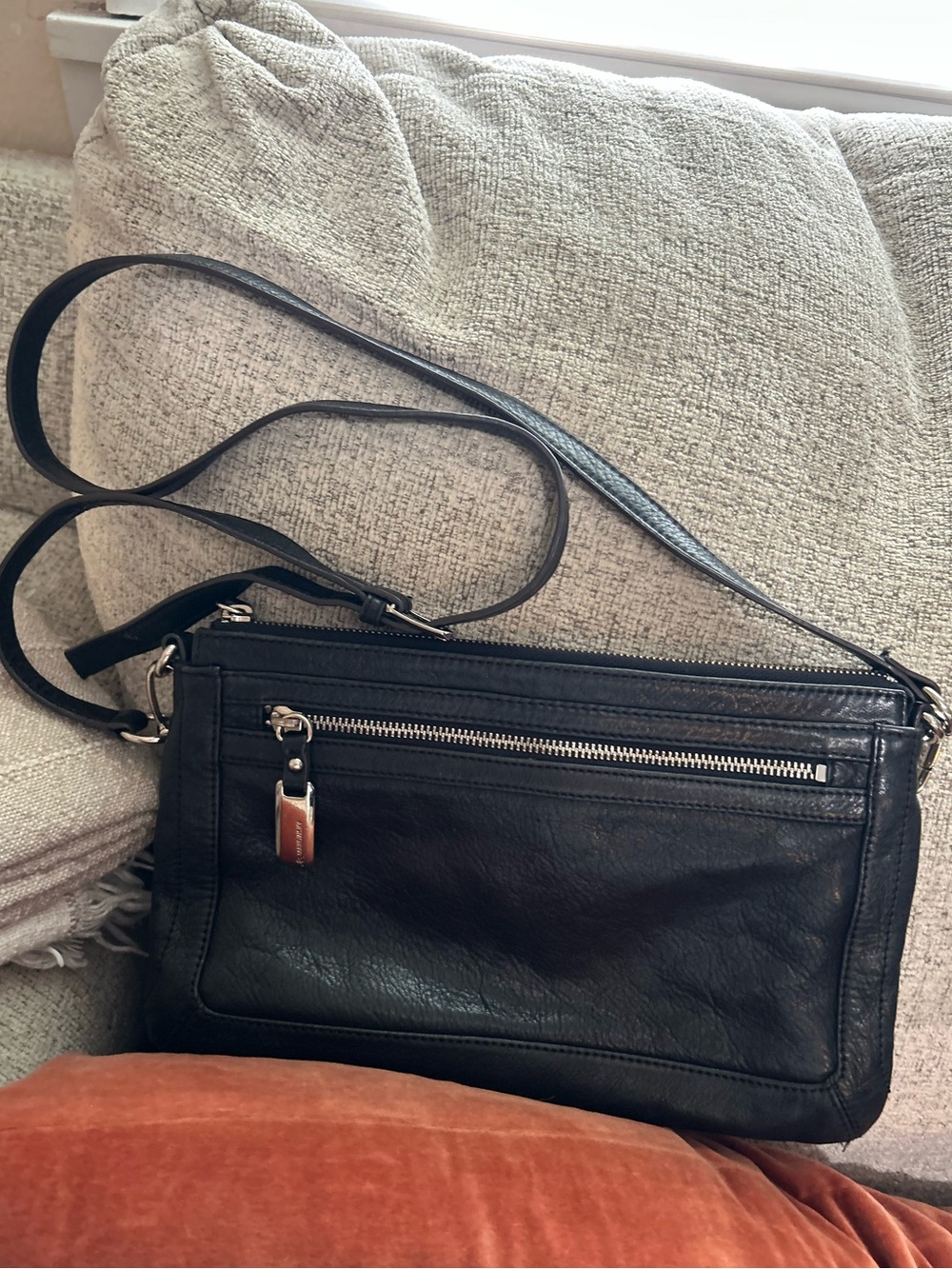 B Makowsky Black Leather Crossbody Bag with Front Zip Pocket